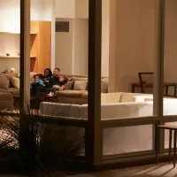 family on a couch in a pest free home